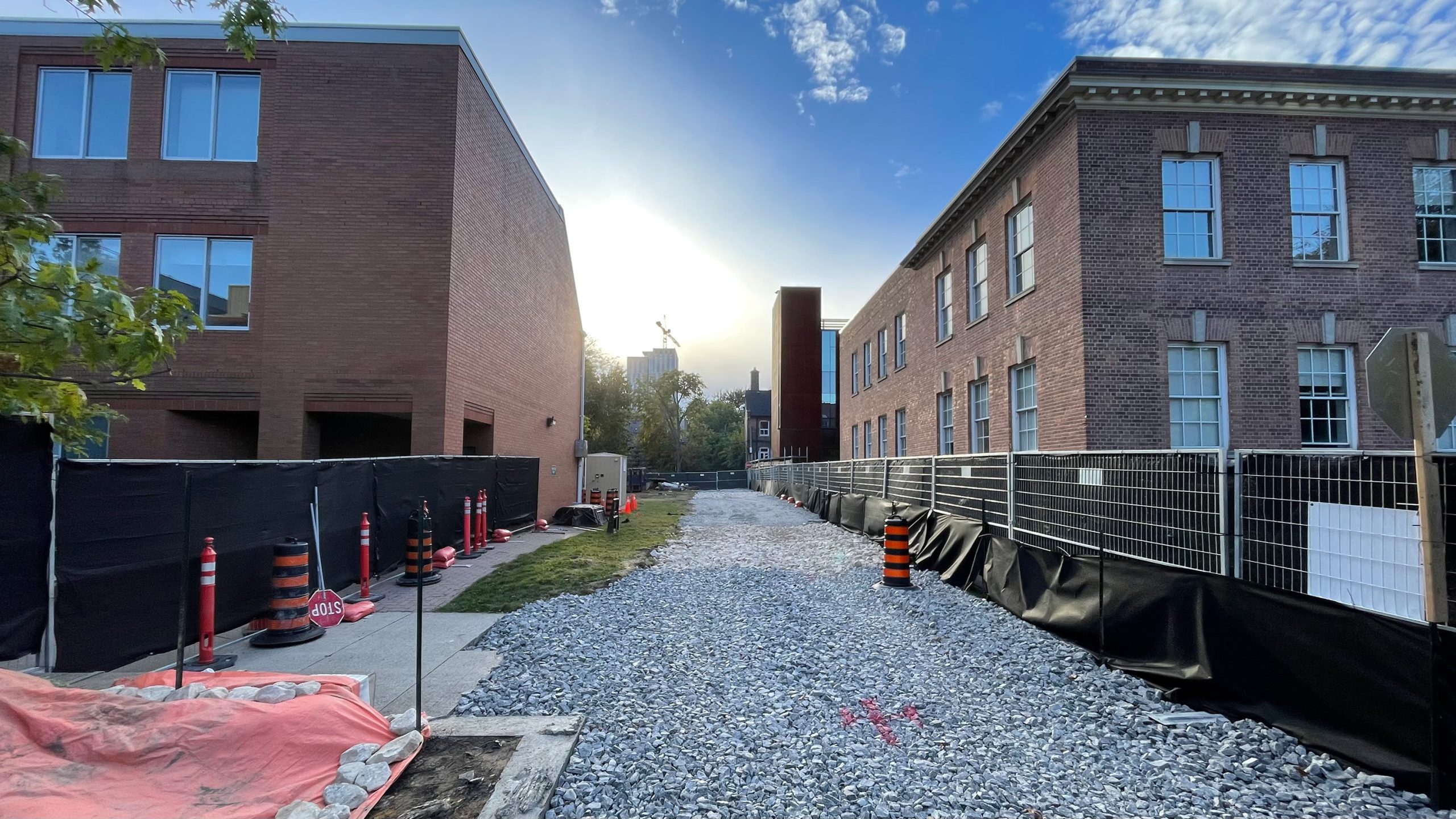 Compacted stone path from site entrance through construction site